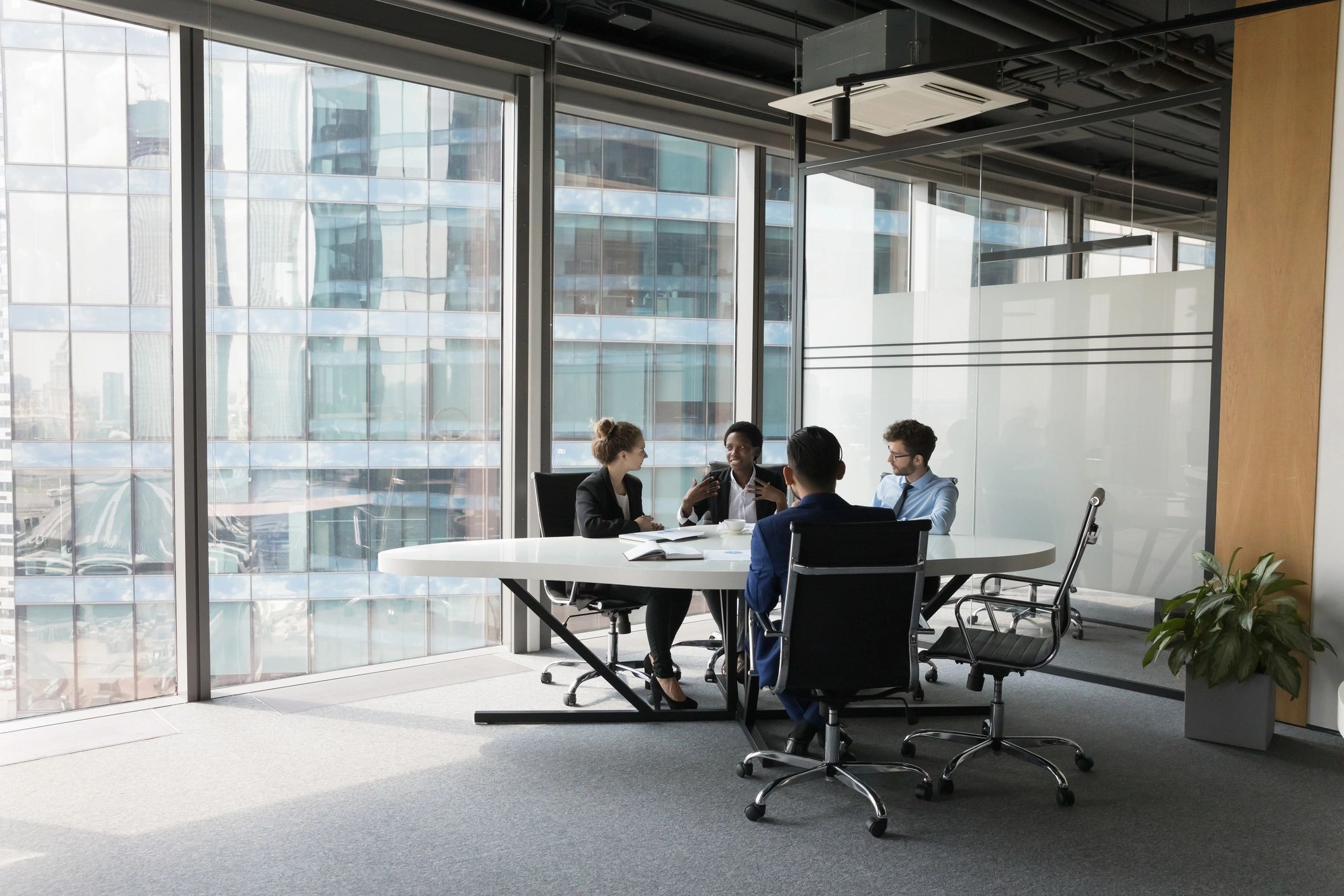 Real estate team meeting in office